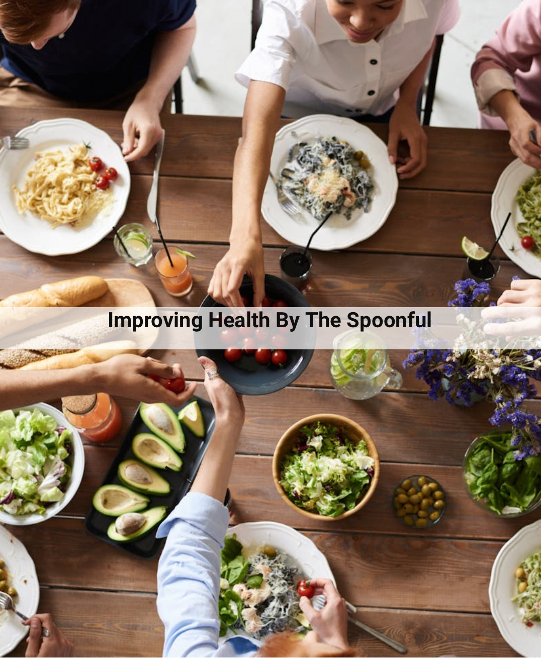 Family eating dinner. Overlaying text says improving health by the spoonful